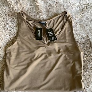 Brand new! Express Body Contour Bodysuit - Nude; Size Small